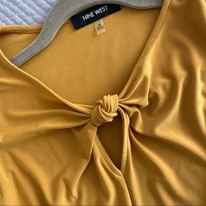 Nine West keyhole detail shell.